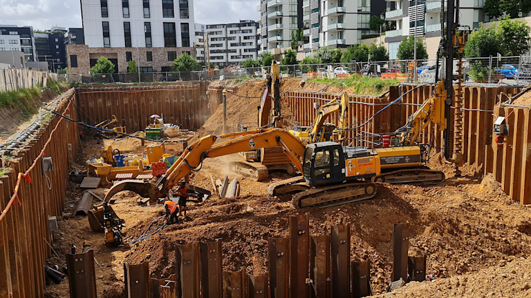 Construction site with excavators and other construction equipment