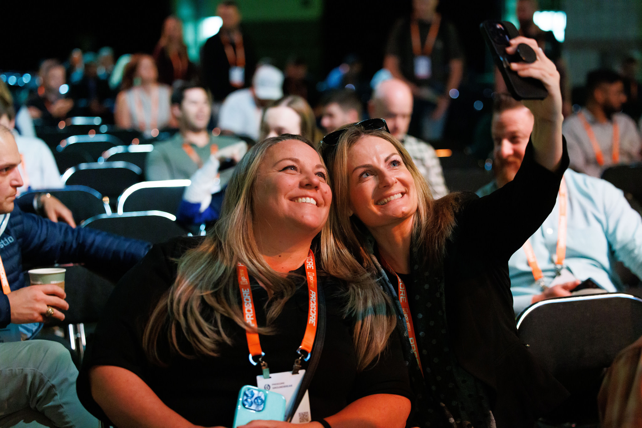 Two Groundbreak attendees taking a picture at the event